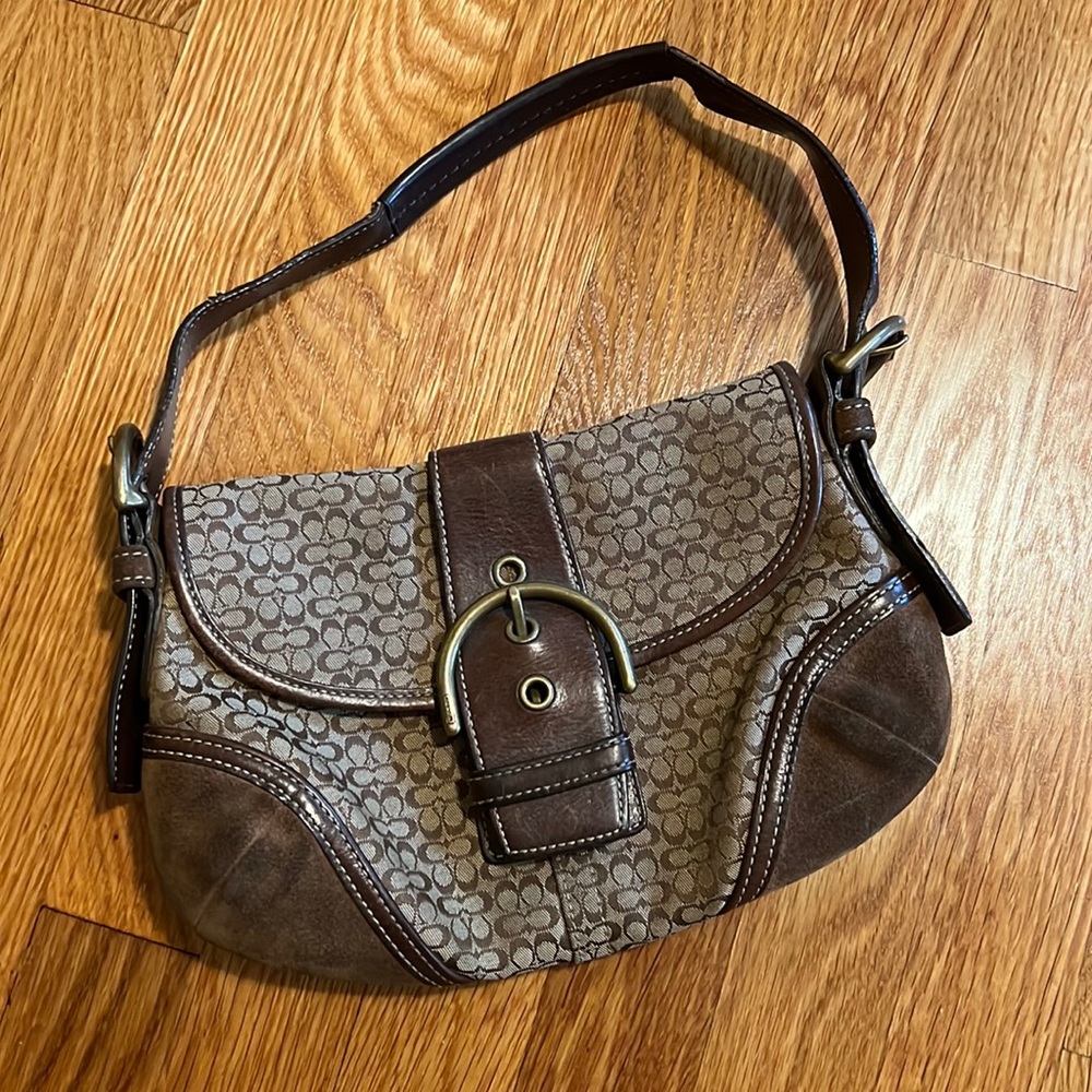 Authentic Coach Purse with front buckle zipper pocket plus two additional pocket